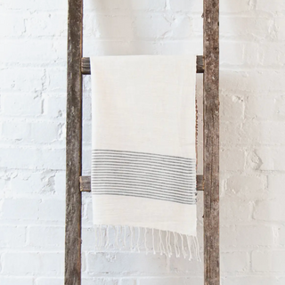 Each riviera hand towel features natural, un-dyed cotton accented with ribbed lines of delicate color. Ribs cotton hand towel. Tasseled ends. Machine wash and dry. 100% hand-spun Ethiopian cotton. Measures 21'' x 27''. 