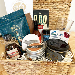 We love to support local and love it when a plan comes together! Our ENC Beef Barbecue Hamper includes a gift card from ENC Beef for your choice of 8 hamburger patties or 2 ribeye steaks, Red Eye Coffee Rub from Vivian Howard, cheese wafers from The Night Baker, spices from Asheville Spice, He's on Fire Hot Sauce, Bear Food Peanuts and Soul Kitchen's Hot Pepper Vinegar -- also includes a NC pint glass, small cedar grill plank and BBQ themed coasters. This is ENC at it's BEST!!!