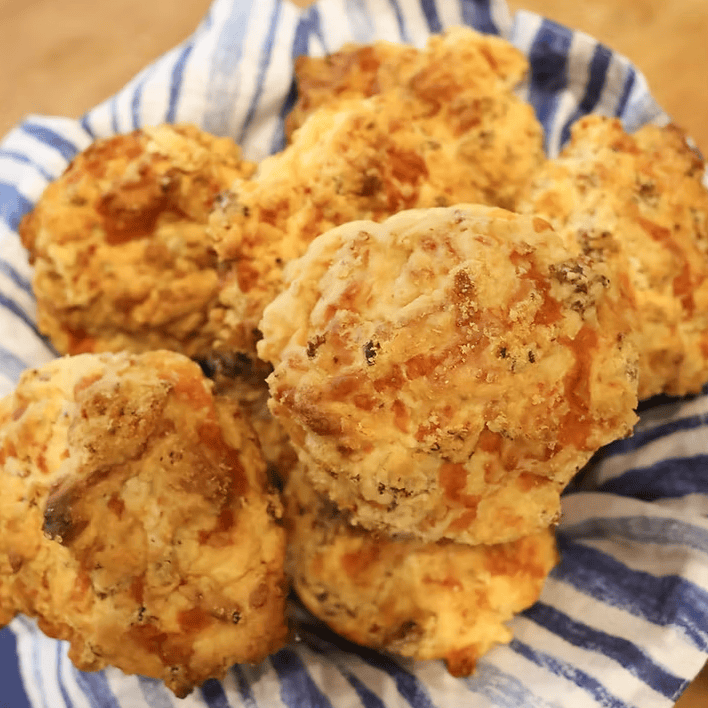 Muffins on a blue and white striped plate