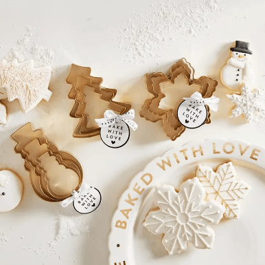 Decorative cookies with 'Baked with Love' text on a white background