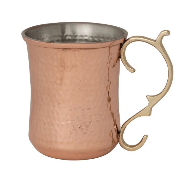 Copper mug with a brass handle on a white background