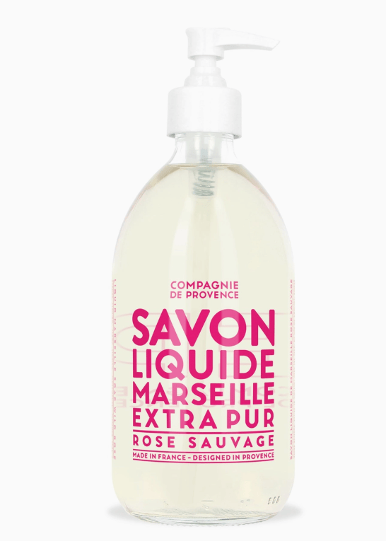 Bottle of Compagnie de Provence Marseille Liquid Soap with pink text on a white background