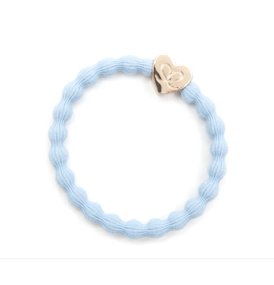 Light blue hair tie with a gold heart-shaped clip on a white background