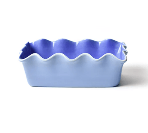 Iris blue ceramic loaf pan on white background. 