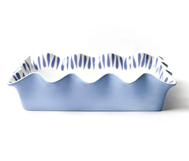 Iris Blue Drop 13" casserole dish with ruffled edge on a white background.