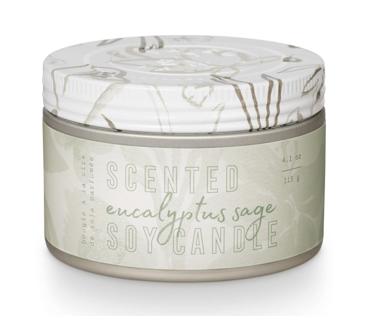 Scented eucalyptus sage soy candle with marble design on a white background