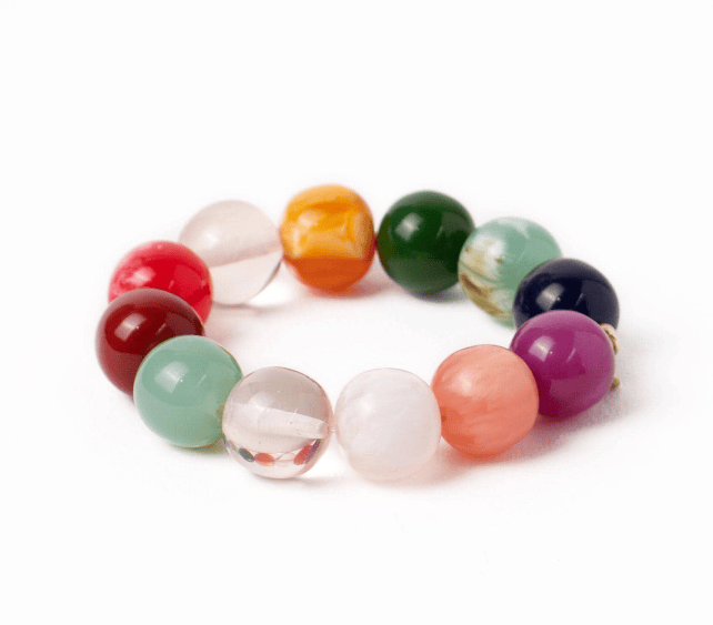 Multicolored beaded bracelet on a white background