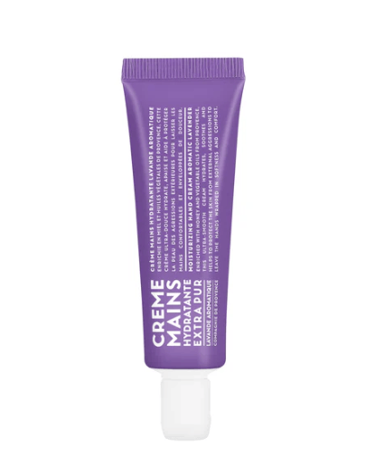 Purple tube of hand cream labeled 'Creme Mains Hydratante Extra' on a white background