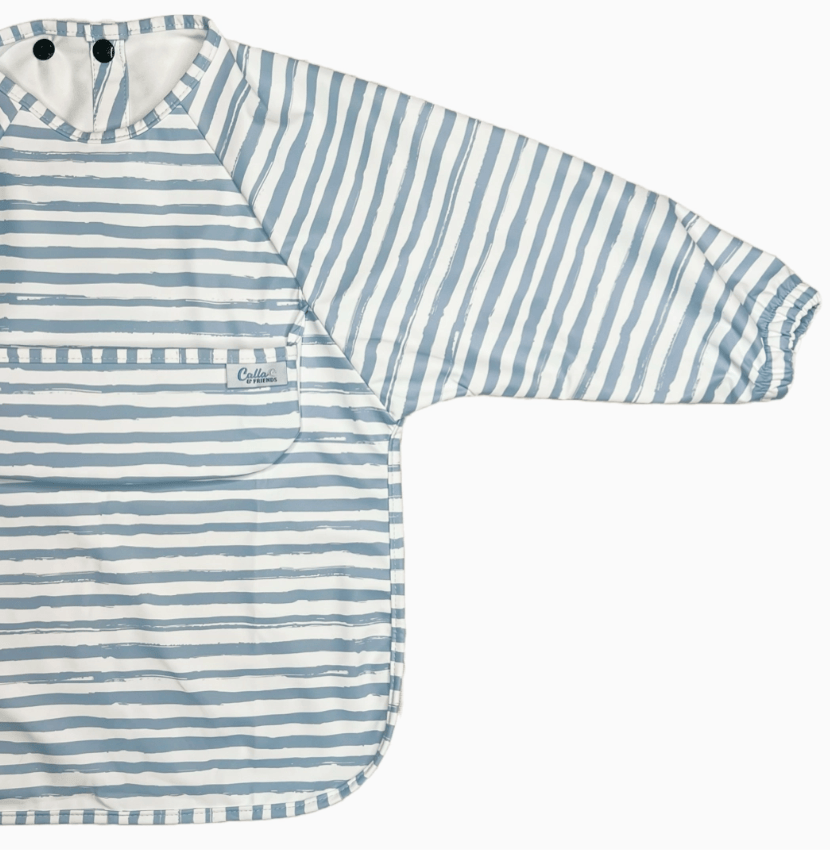 Blue and white striped baby bib with a brand label on a white background