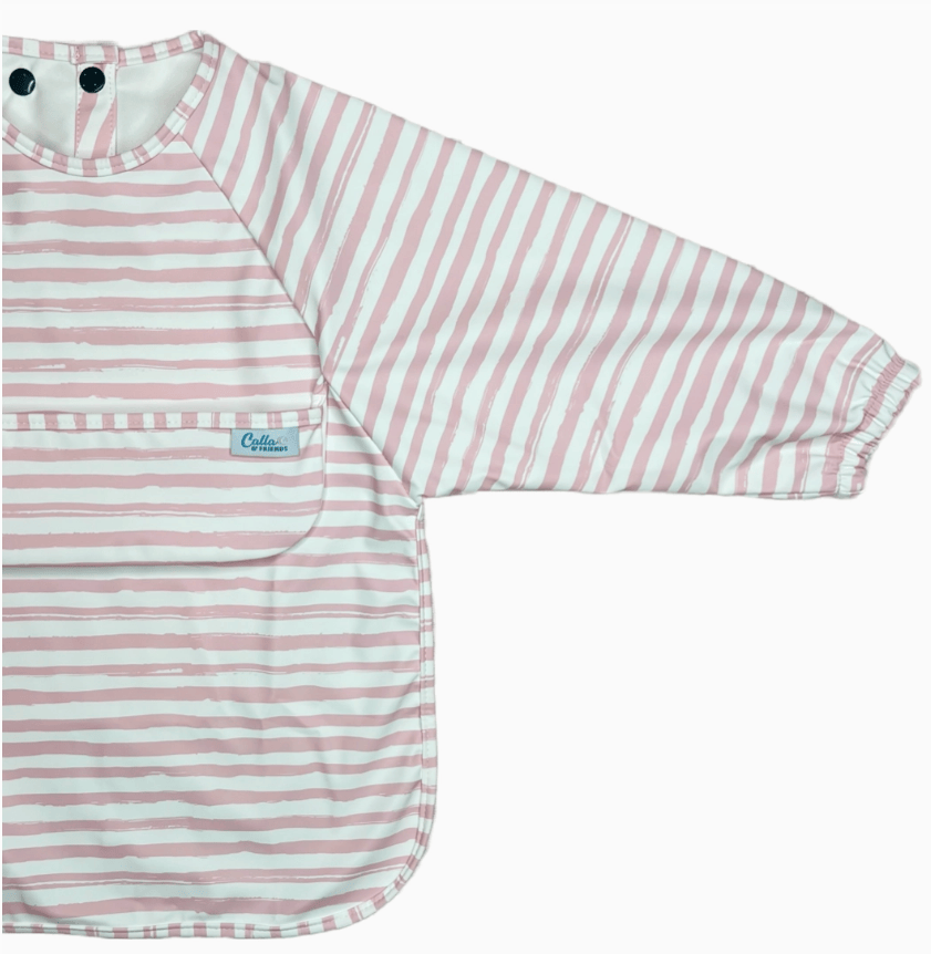 Pink and white striped baby bib with long sleeves on a white background