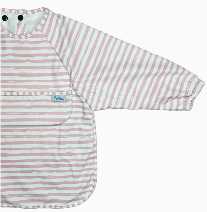 Pink and white striped baby bib with long sleeves on a white background