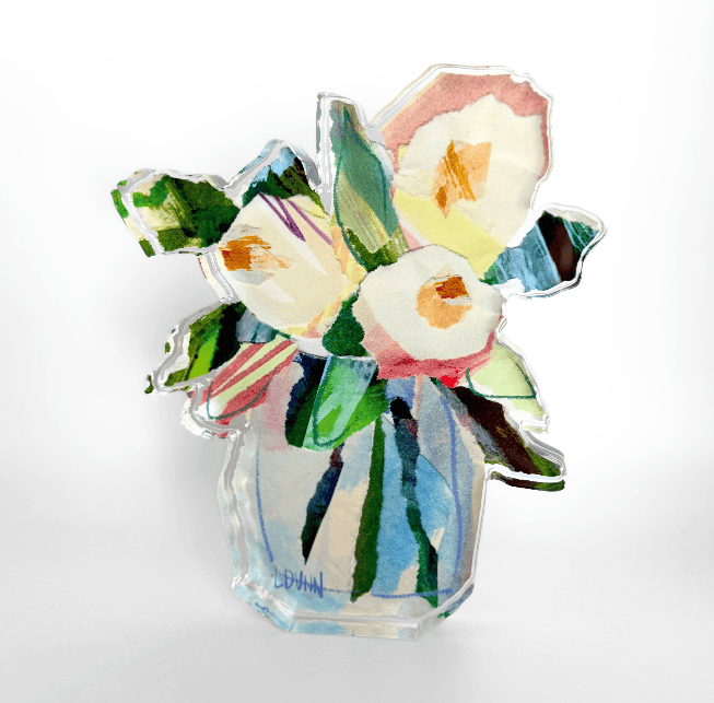 Floral design acrylic block with a vase of flowers on a white background