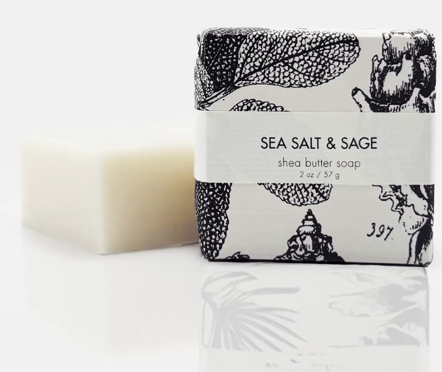 Shea butter soap bar with 'Sea Salt & Sage' packaging on a white background
