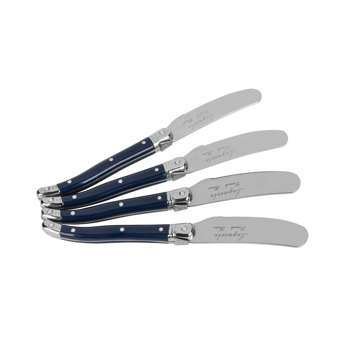 Set of four cheese spreaders with blue handles on a white background