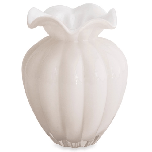 White glass vase with a fluted design on a white background