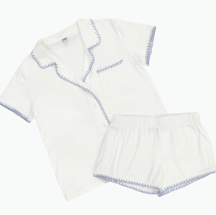 White short pj set with blue trim on a white background