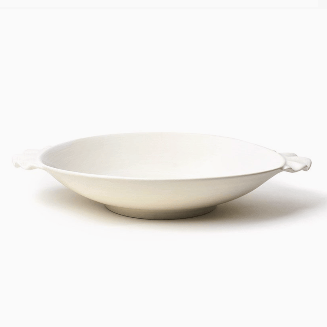 White ceramic bowl on a white background
