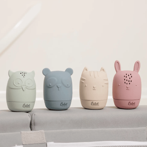Four animal-shaped humidifiers in pastel colors on a light background