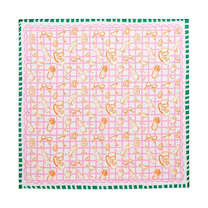 Pink fabric with a pattern of small shapes on a white background