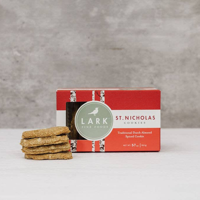 Box of St. Nicholas Animal Foods Lark dog treats on a gray background