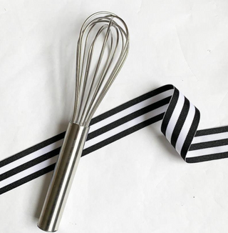 Expertly mix thick sauces and batters with this 10" stainless steel French whip/whisk! Featuring a rust-free 18/8 stainless steel design paired with heavy-gauge, spring wire loops, this dependable item is built to last!  