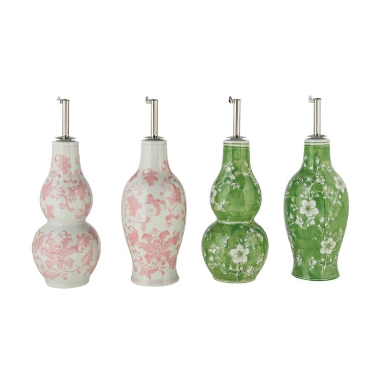 Four decorative bottles with floral patterns on a white background