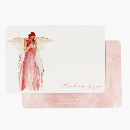 Card with angel illustration and 'Thinking of you' text on a pink watercolor background