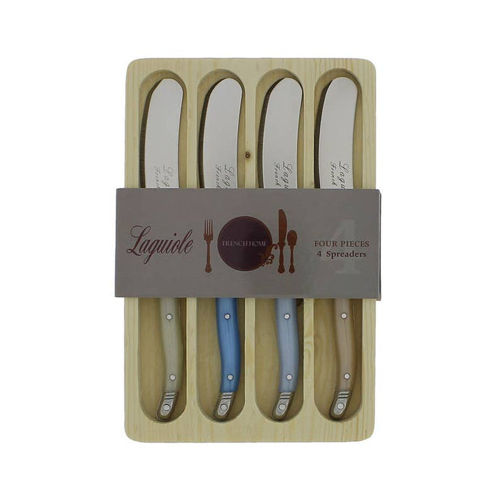 Set of four Laguiole spreaders in wooden holder with branded label.