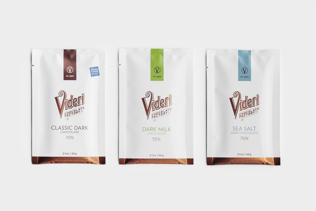 fine, hand-crafted, artisan chocolate by being a welcoming chocolate factory that makes people feel happy and at home.  70% Classic Dark ,Sea Salt Dark Chocolate bars and Dark Milk Chocolate bars. 70% Classic Dark Chocolate Bar - our tried and true, perfectly balanced dark chocolate. 70% Sea Salt Chocolate Bar - a salty twist on our classic chocolate for an irresistible sweet-salty combo. 55% Dark Milk Bar - our take on a creamy and sweet milk chocolate