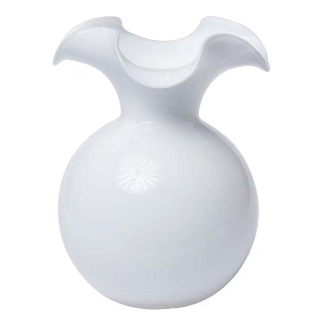 White ceramic vase with a wavy top on a white background