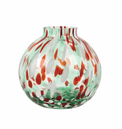 A round glass vase with a short neck, featuring a hand-blown design with green, white, and red patterns on a solid white background.