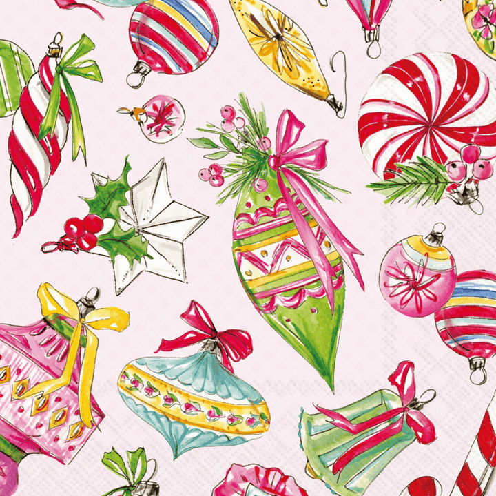 A festive Christmas pattern featuring watercolor illustrations of ornaments, candy canes, a striped peppermint, holly, pinecones, and bows on a pale pink background.