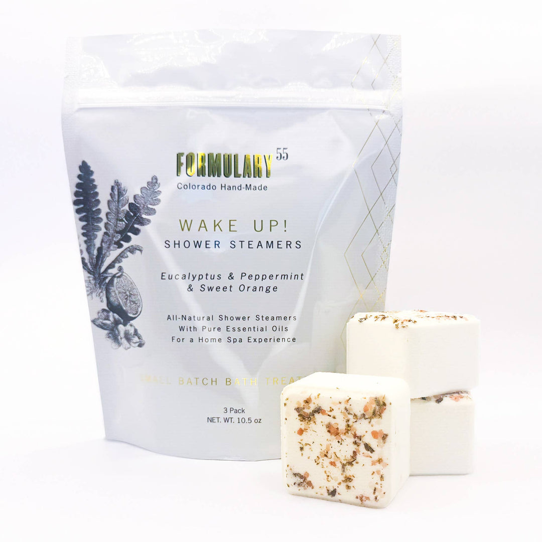 Pack of Formulary 55 Wake Up! Shower Steamers with two steamers on a white background