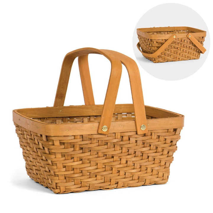 Wicker picnic basket with handles on a white background