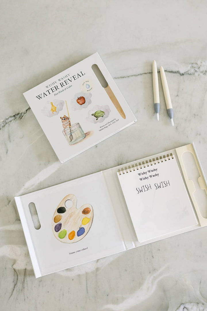 Children's book with watercolor illustrations on a marble surface
