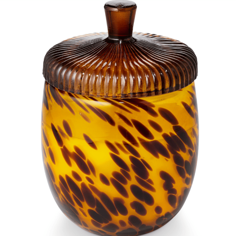 A decorative glass jar with a ribbed lid and a glossy amber-brown and yellow marbled pattern, shown on a white background.