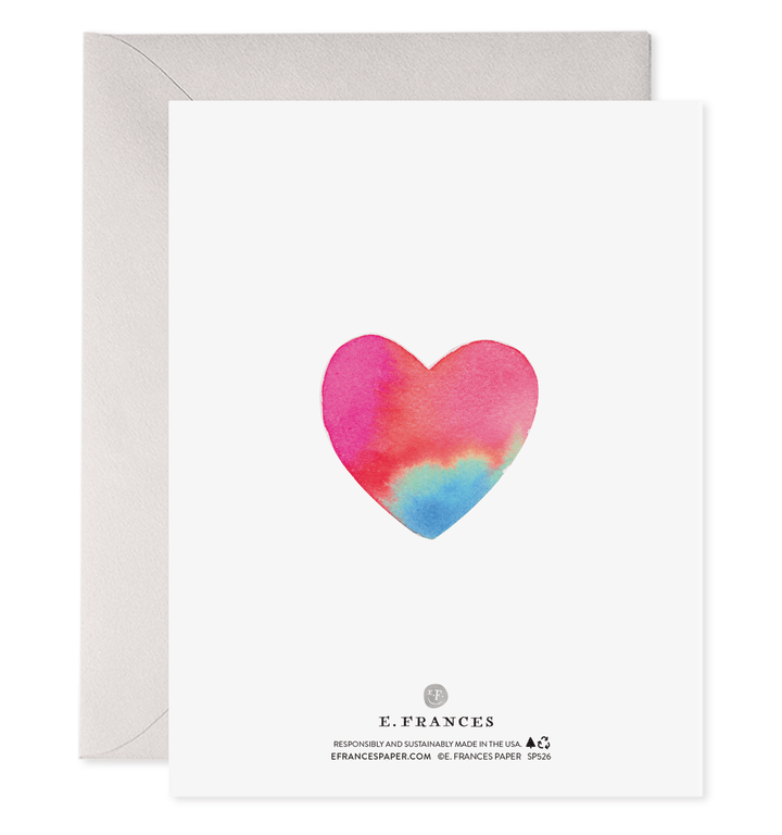 Greeting card with a colorful heart design and envelope on a white background
