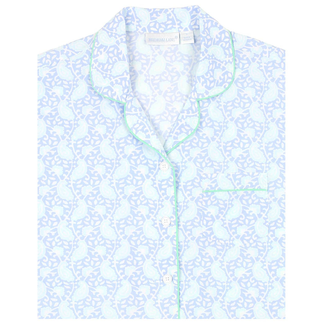 Light blue floral patterned shirt on a white background