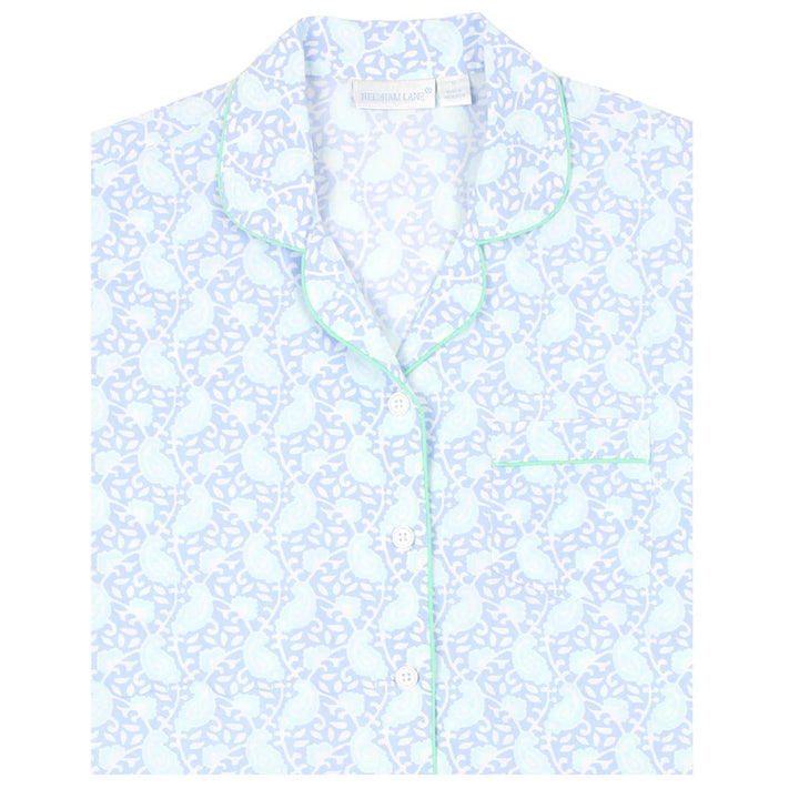 Light blue floral patterned shirt on a white background