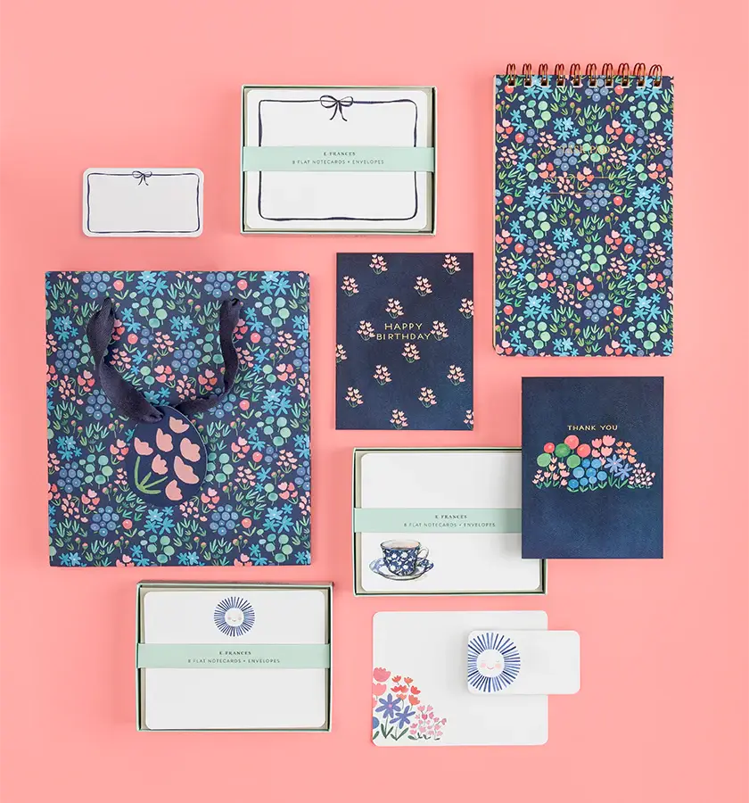 Assorted  E Francis items that go with flat notecards with navy bow