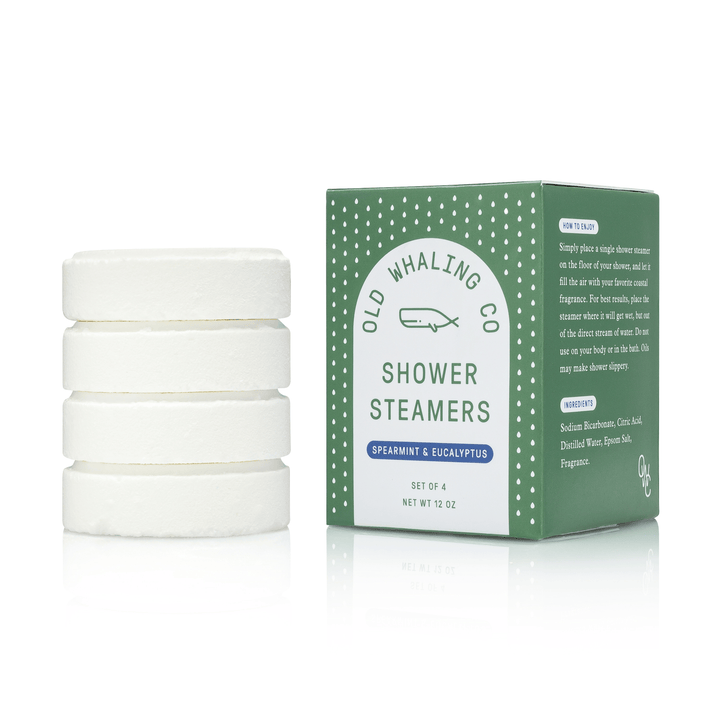 Set of white shower steamers with a green box labeled 'Old Whaling Co.' on a white background