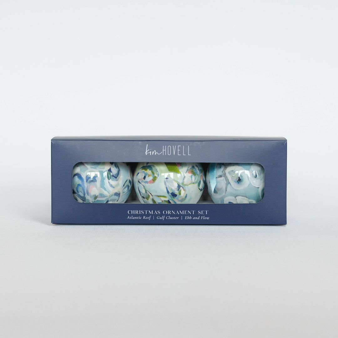 Set of three Christmas ornaments in a box with 'Hoyt' branding on a light gray background