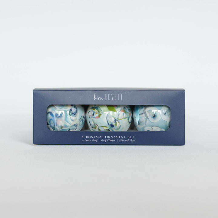 Set of three Christmas ornaments in a box with 'Hoyt' branding on a light gray background