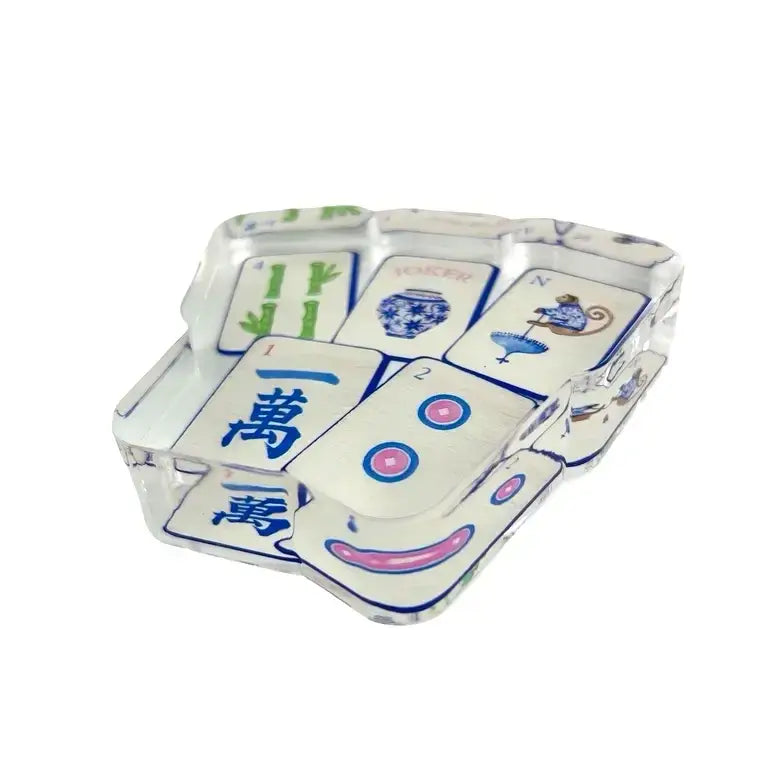 Chinese mahjong napkin weight on a white background