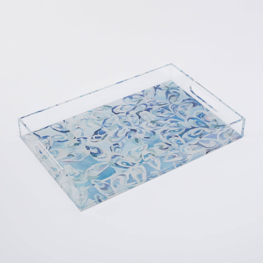 Clear glass tray with atlantic reef oyster pattern on a white background