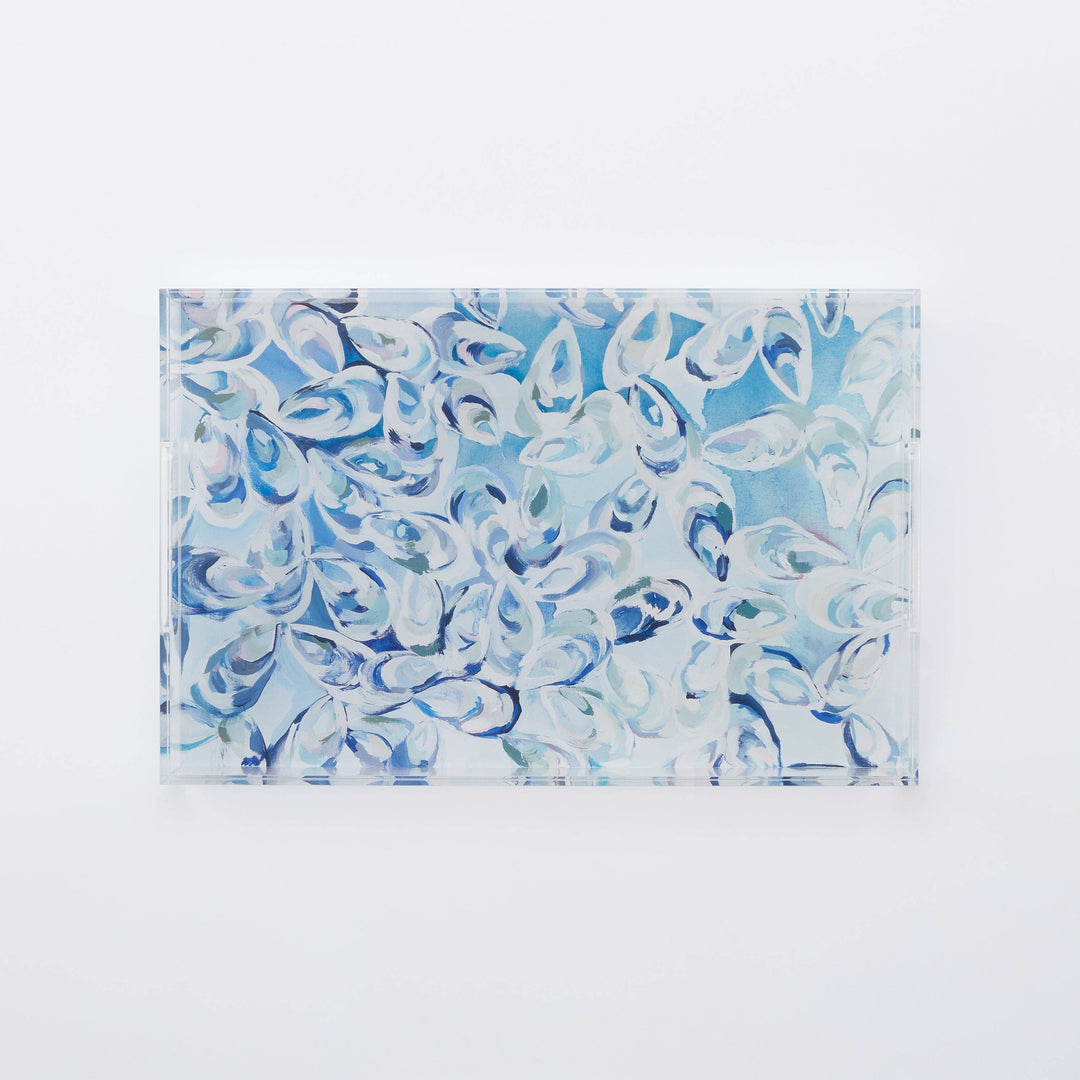 Acrylic tray with blue oyster pattern on a white background