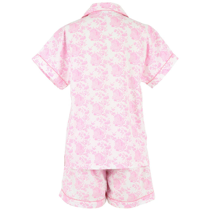 Pink floral shirt and shorts set on a white background