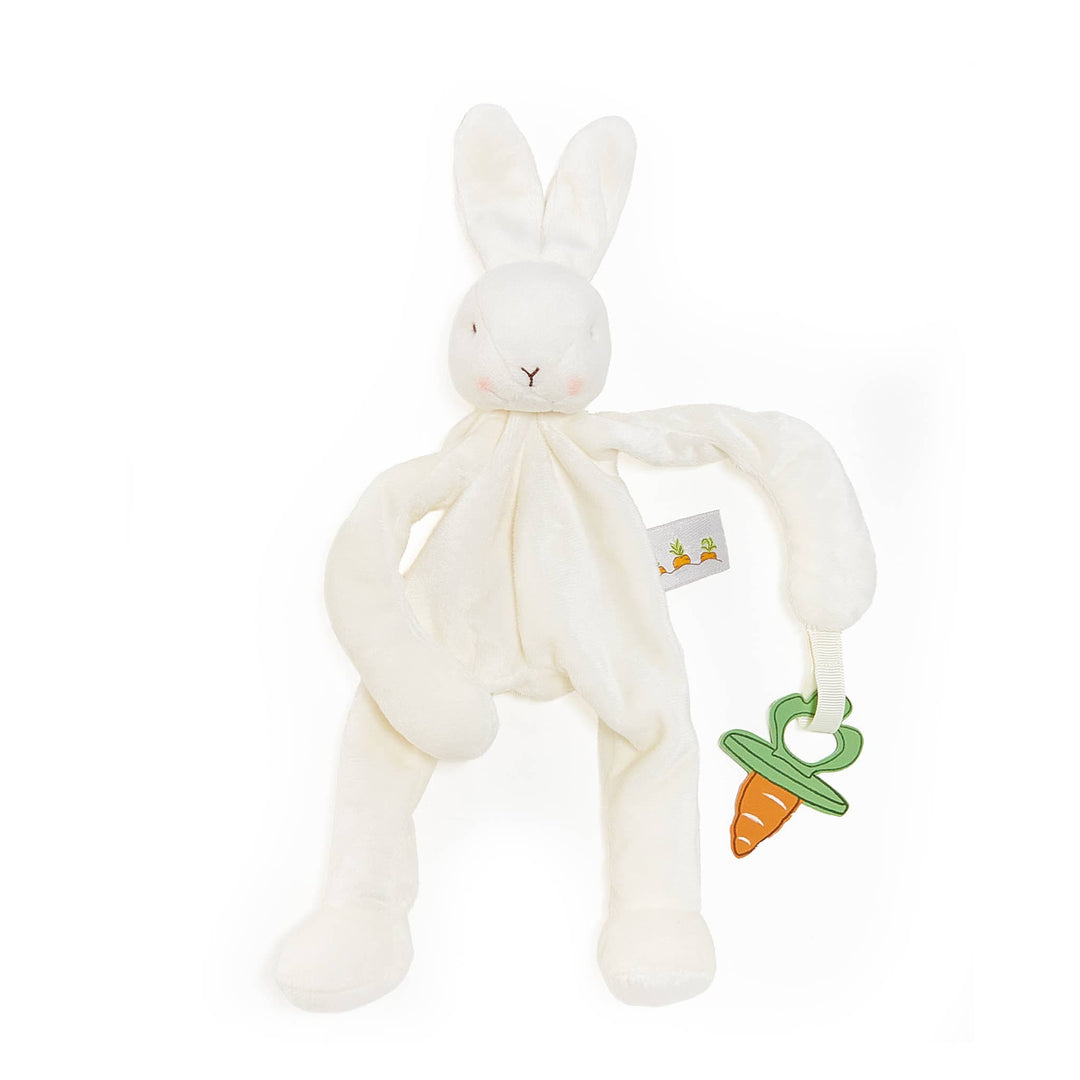 A white plush bunny lovey comforter toy with long arms and legs, featuring a small green and orange carrot teether attached to one arm, set against a plain white background.