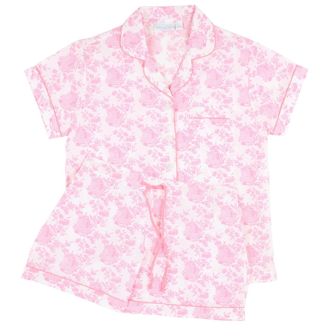 Pink floral pajama set on a white background