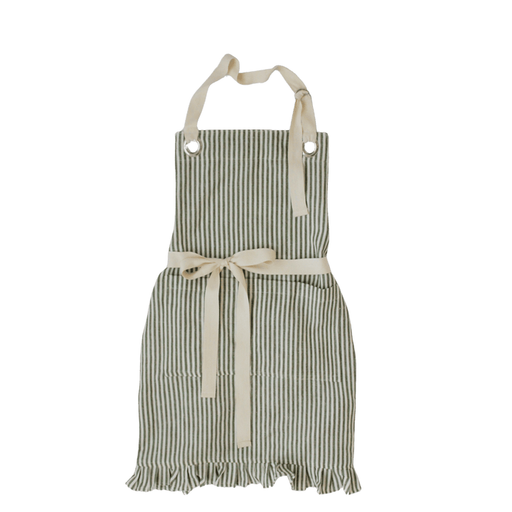 A striped kitchen apron with cream-colored neck and waist ties, featuring vertical dark green and off-white stripes, a front pocket, and a ruffled hem, shown against a solid green background.